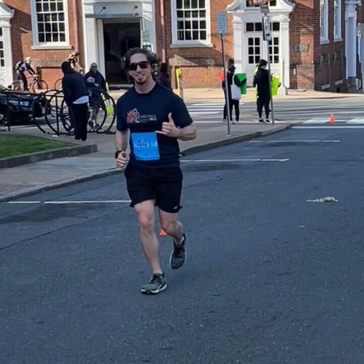 Runner training outdoors in Hudson, MA working on gait mechanics and injury prevention with physical therapy guidance Runner training outdoors in Hudson, MA working on gait mechanics and injury prevention with physical therapy guidance